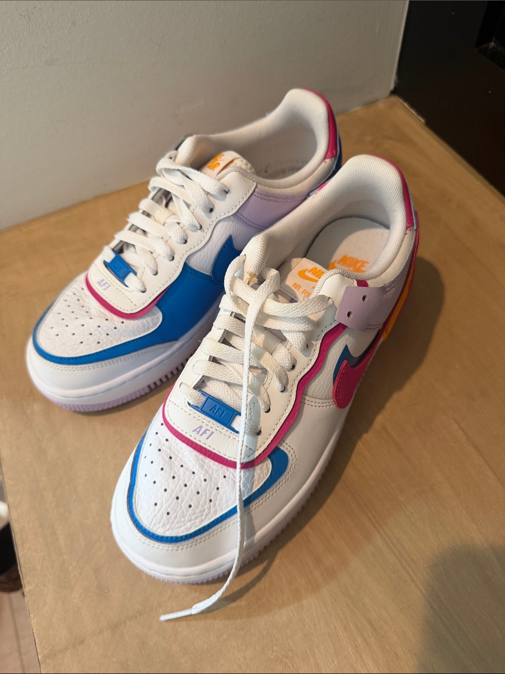 Nike White Low-Top Sneakers with Blue, Pink, Purple & Orange Accents - Picture 2 of 4
